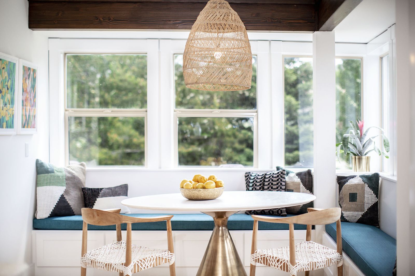 Bright breakfast room with custom banquette